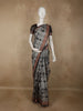 Charcoal Grey Ikat Printed Design Semi Tussar Saree with Striped Border