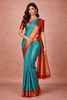 Teal Blue Checks And Annapakshi Motif Woven Pure Kanchipuram Silk Saree With Contrast Red Zari Border