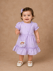 Lavender Cotton Frock Adorned with Floral and small checks Designs and Sling Bag for Girls