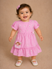 Pale Pink Cotton Frock Adorned with Floral and Small Checks Designs Girls