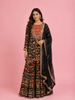Black Cotton Sharara salwar Suit Adorned with Printed Floral Design and Embroidery Mirror work Paired with Dupatta