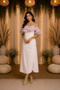 Ivory Frock Adorned with Plain and Ruffled Design