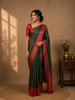 Bottle Green Floral Woven Pure Kanchipuram Silk Saree With Zari Border