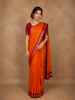 Bright Orange Floral Design Kanchipuram Silk Saree
