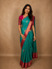 Turquoise Green Butta Zari Woven Design Pure Kanchipuram Silk Saree with Contrast Floral Zari Border