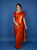 Orange Floral Motif Woven Pure Kanchipuram Silk Saree With Rich Zari Border