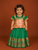 Green and Peach Silk Pattu Pavadai Set Adorned with Zariwork