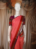 Coral Pink Butta Zari Woven Design Pure Kanchipuram Silk Saree with Contrast Double Zari Border