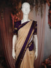 Cream Beige Checked Woven Design Pure Kanchipuram Silk Saree with Contrast Peacock Zari Border