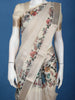 Cream Floral Printed Semi Tussar Saree With Zari Border