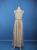 Cream Sleeveless Netted Gown With Sequin Embellishments And Waist Belt