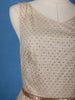 Cream Sleeveless Netted Gown With Sequin Embellishments And Waist Belt