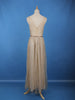 Cream Sleeveless Netted Gown With Sequin Embellishments And Waist Belt