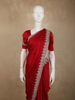 Crimson Red Stone Embellished Design Satin Designer Saree with Scalloped Border