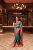 Peacock Blue Butta Zari Woven Design Pure Kanchipuram Silk Saree with Contrast Varisai Pattu Border