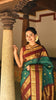 Peacock Blue Butta Woven Design Pure Kanchipuram Silk Saree with Contrast Retta Pattu Border