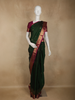 Dark Green Floral Woven Pure Kanchipuram Silk Saree with Contrast Pink Zari Border