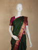 Dark Green Floral Woven Pure Kanchipuram Silk Saree with Contrast Pink Zari Border