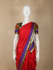 Dark Pink Zari Woven Kanchipuram Silk Saree with Contrast Purple and Green Border