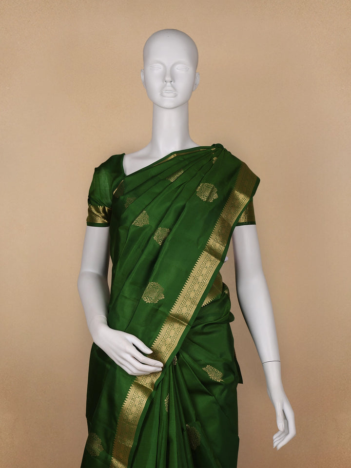 Dark Green Floral Woven Silk saree - Diadem