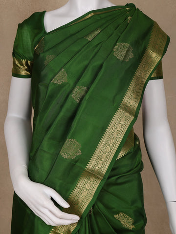 Dark Green Floral Woven Silk saree - Diadem