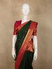 Deep Bottle Green Peacock Butta Zari Woven Design Pure Kanchipuram Silk Saree with Contrast Varisai Pattu Border