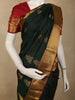 Deep Forest Bottle Green Floral Butta Zari Woven Design Pure Kanchipuram Silk Saree with Contrast Temple Zari Border