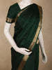 Deep Forest Green Solid Woven Design Pure Kanchipuram Silk Saree with Zari Border