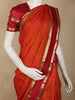Deep Rust Orange Solid Woven Design Kanchipuram Silk Saree with Zari Border