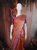 Deep Rust Red Floral Zari Woven Design Pure Kanchipuram Silk Saree with Contrast Floral Zari Border