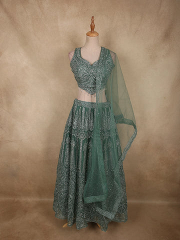 Deep Teal Emerald Green Zari Embroidered and Stone Embellished Design Net Lehenga With Net Dupatta | Diadem Deep Teal Emerald Green Zari Embroidered and Stone Embellished Design Net Lehenga With Net Dupatta | Diadem