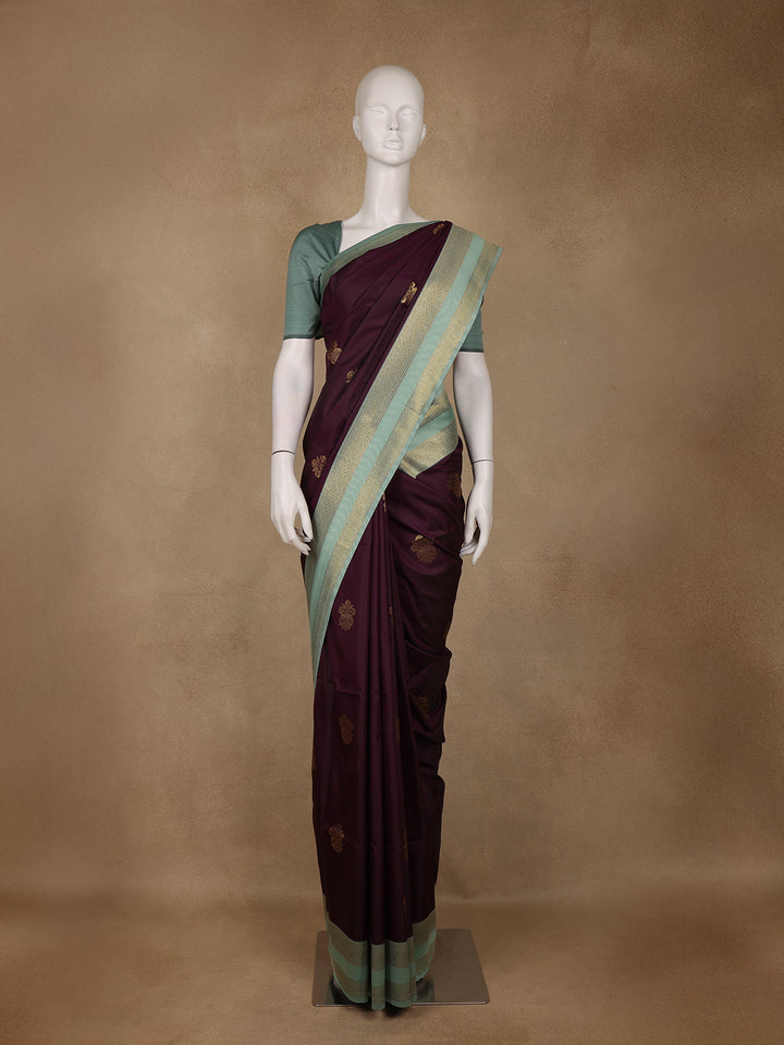 Deep Wine Floral Woven Soft Silk Saree with Sea-Green Contrast Border - Diadem
