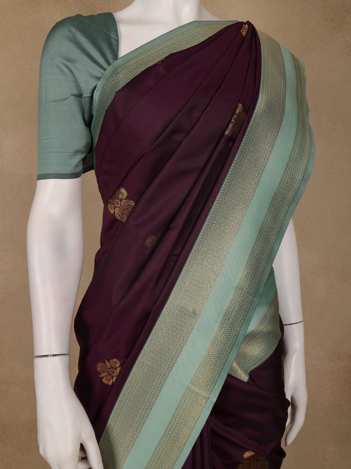 Deep Wine Floral Woven Soft Silk Saree with Sea-Green Contrast Border - Diadem