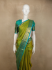 Dual-Tone Lime Parrot Green Striped and Butta Zari Woven Design Pure Kanchipuram Silk Saree with Contrast Floral Zari Border