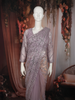Dusty Lavender Heavy Sequins Embroidered Design Net Fancy Saree with Scalloped Border