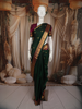 Elegant Bottle Green Butta Zari Woven Design Pure Kanchipuram Silk Saree with Contrast Border