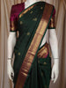 Elegant Bottle Green Butta Zari Woven Design Pure Kanchipuram Silk Saree with Contrast Border