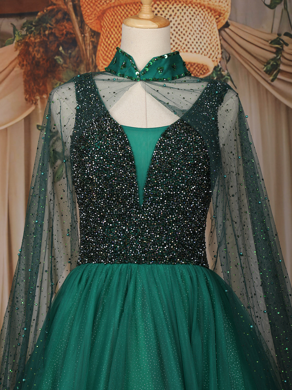 Emerald Green Sequins Embroidered Design Net Gown With Sheer Cape Sleeves | Diadem Emerald Green Sequins Embroidered Design Net Gown With Sheer Cape Sleeves | Diadem