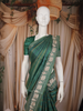 Emerald Green Solid Woven Design Tussar Fancy Saree with Floral Thread Work Border
