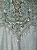 Frosted Aqua Blue Heavy Sequins and Beads Embroidered Design Sequins Indo Western Lehenga with High Neck Cape