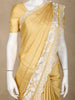 Golden Solid Design Tussar Saree with White Thread Embroidered Lace Border