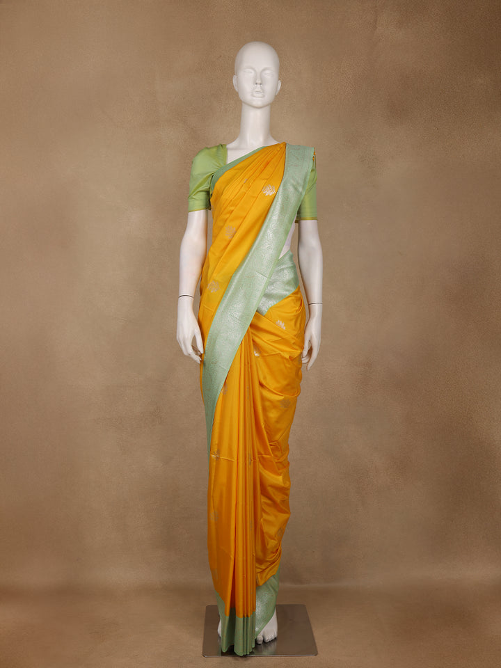 Golden Yellow Leaf Woven Soft Silk Saree with Mint Green Contrast Border - Diadem