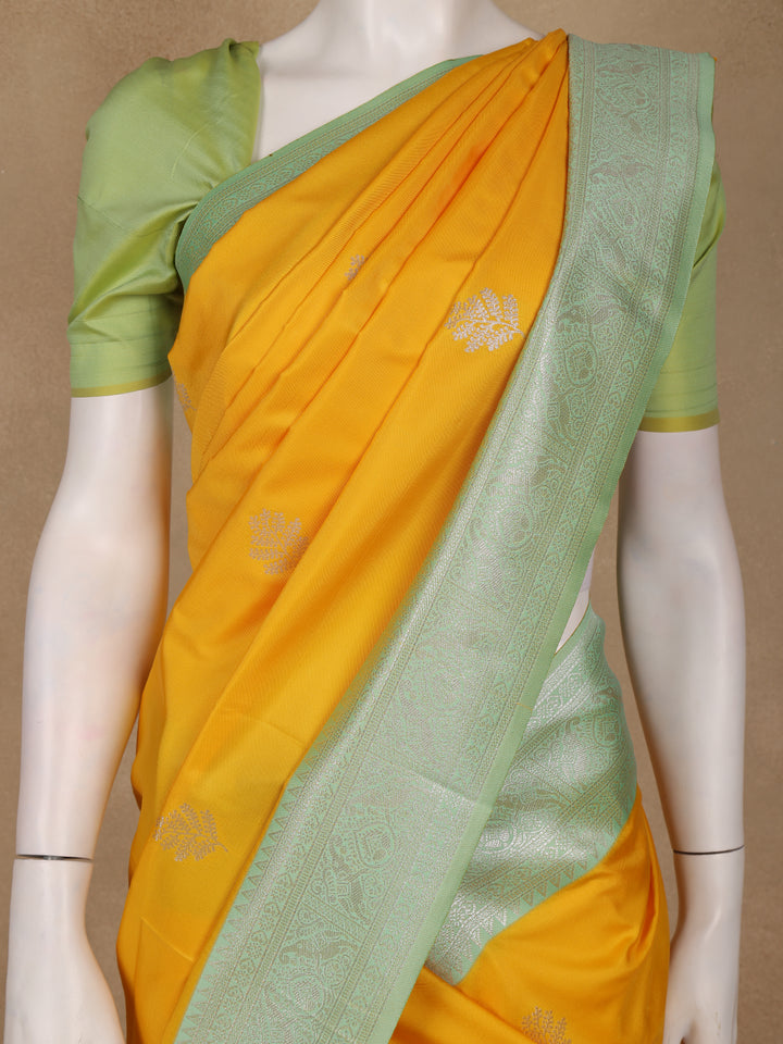 Golden Yellow Leaf Woven Soft Silk Saree with Mint Green Contrast Border - Diadem
