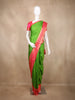 Green Butta Woven Kanchipuram Silk Saree with Contrast Pink Zari Border