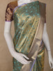 Green Floral Design Semi Tissue Silk Saree
