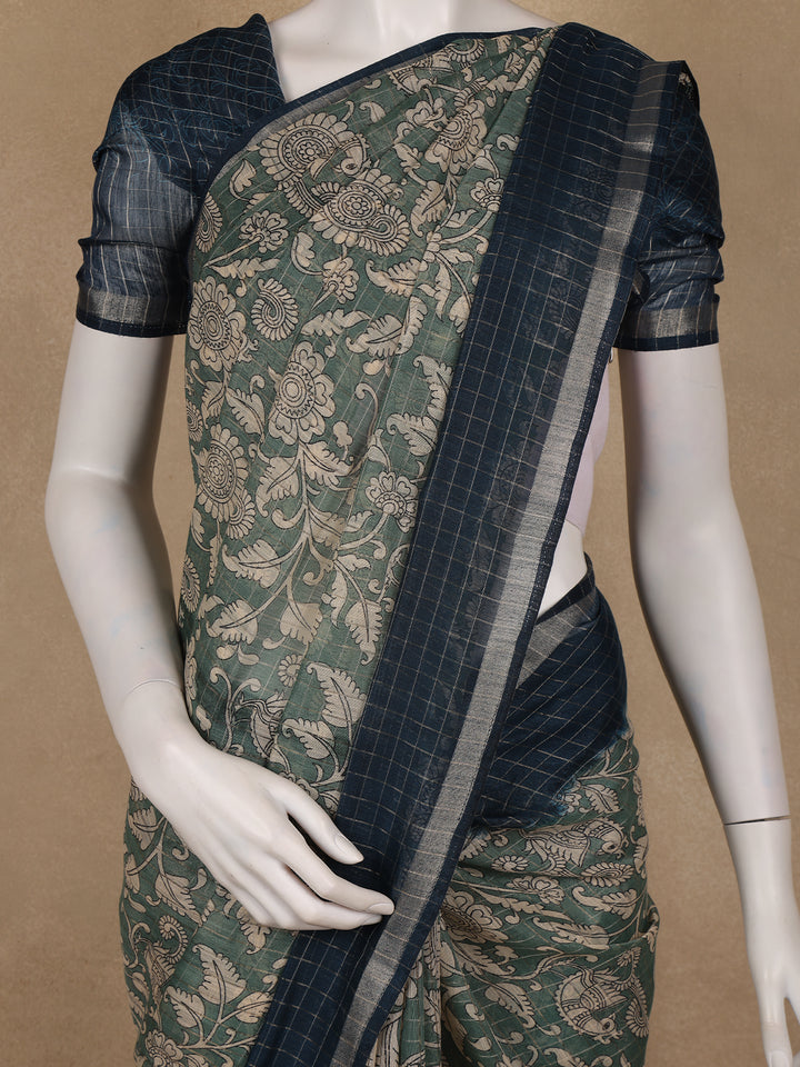 Green Kalamkari Printed Tussar Silk Saree With Contrast Teal Blue Border - Diadem