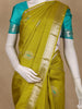 Green Paisley Design Woven Pure Kanchipuram Silk Saree