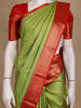 Green Tree Woven Kanchipuram Silk Saree With Contrast Red Zari Border