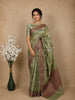 Green Tussar Silk Saree with Floral Prints on the body and Thread Border