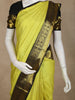 Lemon Yellow Kanchipuram Silk Saree with Small Checks on the body and Contrast Zari Border